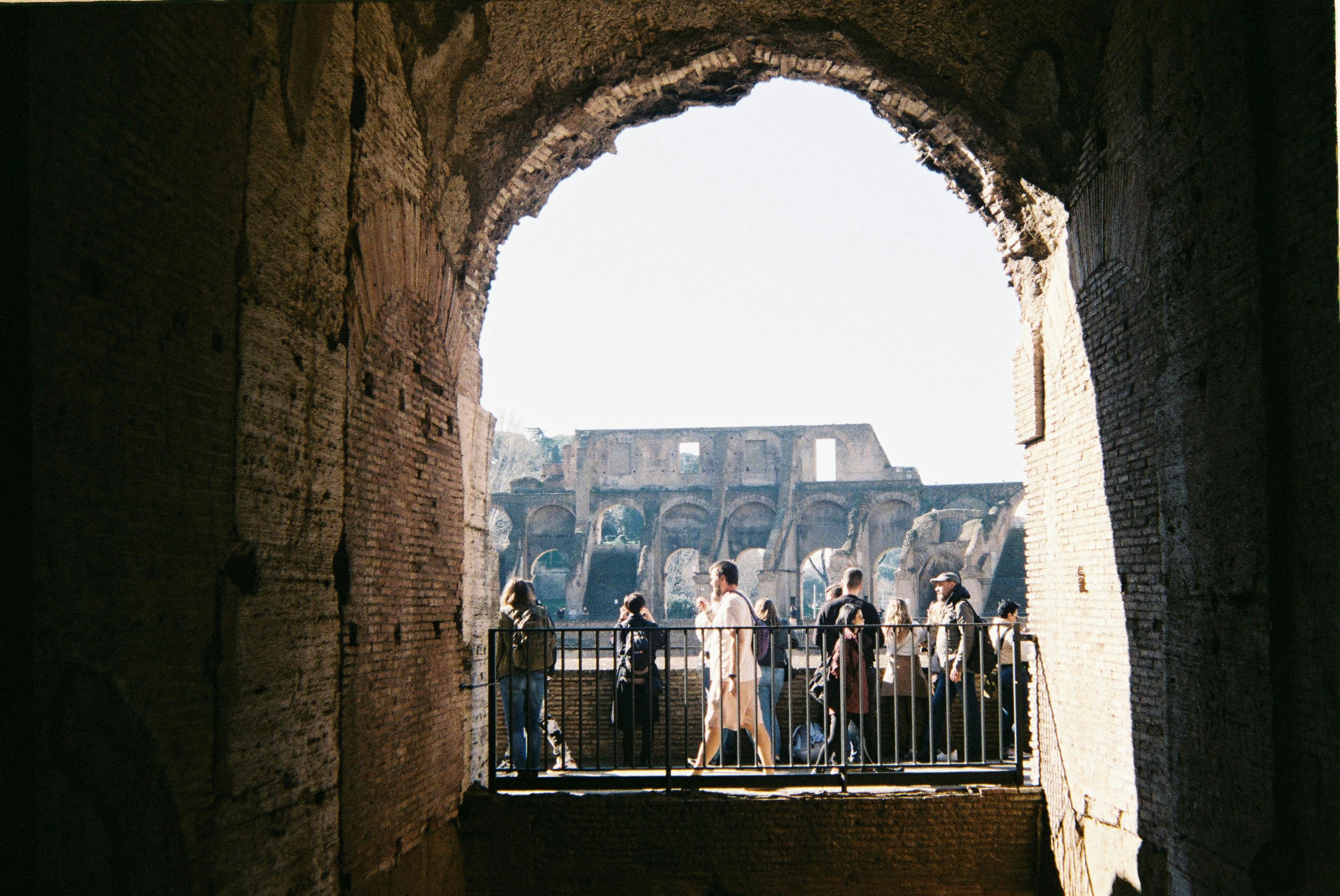 Entry to the Colosseum, Roman Forum, and Palatine Hill with Audioguide + Guided Tour of the Historic Center - Accommodations in Rome