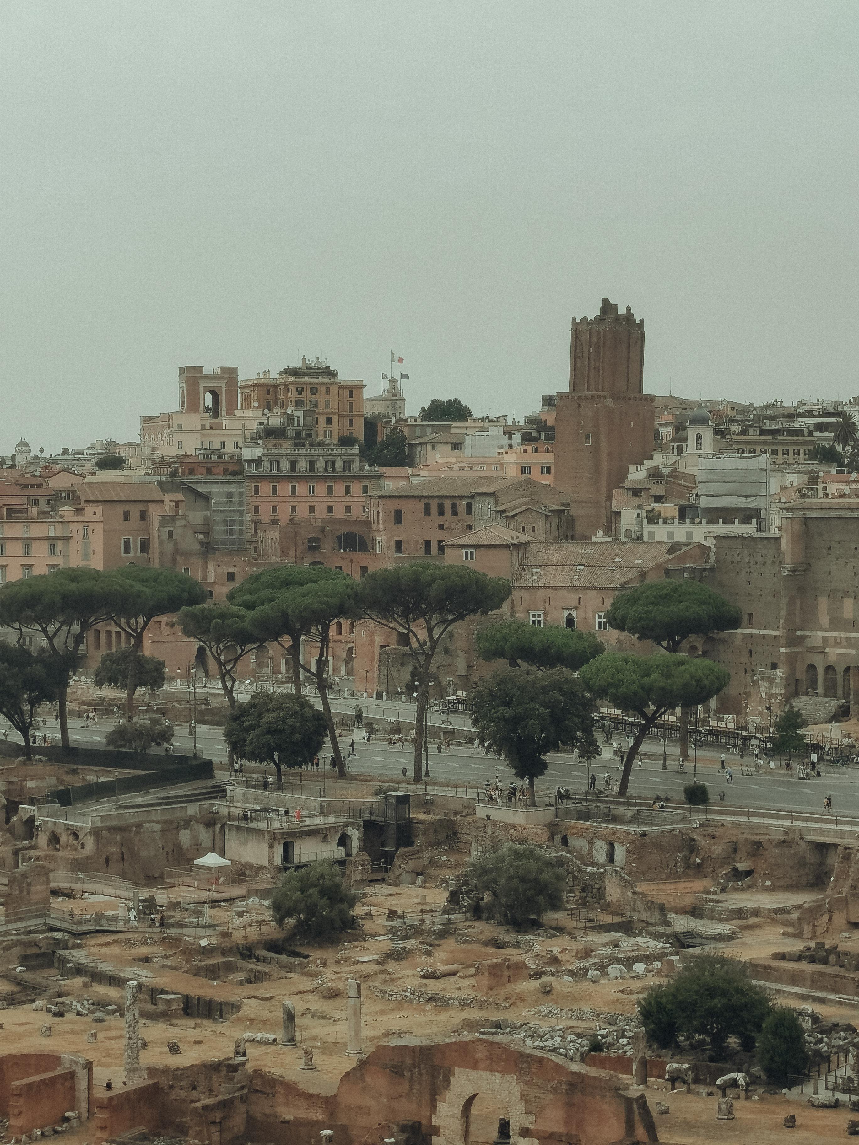 Entry to the Colosseum, Roman Forum, and Palatine Hill with Audioguide + Guided Tour of the Historic Center - Accommodations in Rome
