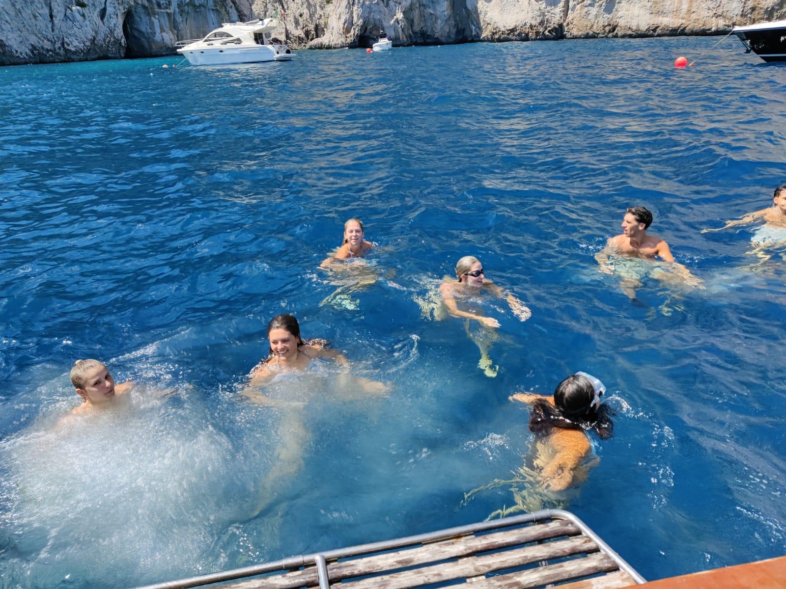 Capri Boat Experience: Faraglioni, Caves, Swim, Limoncello & Snacks - Photo 7