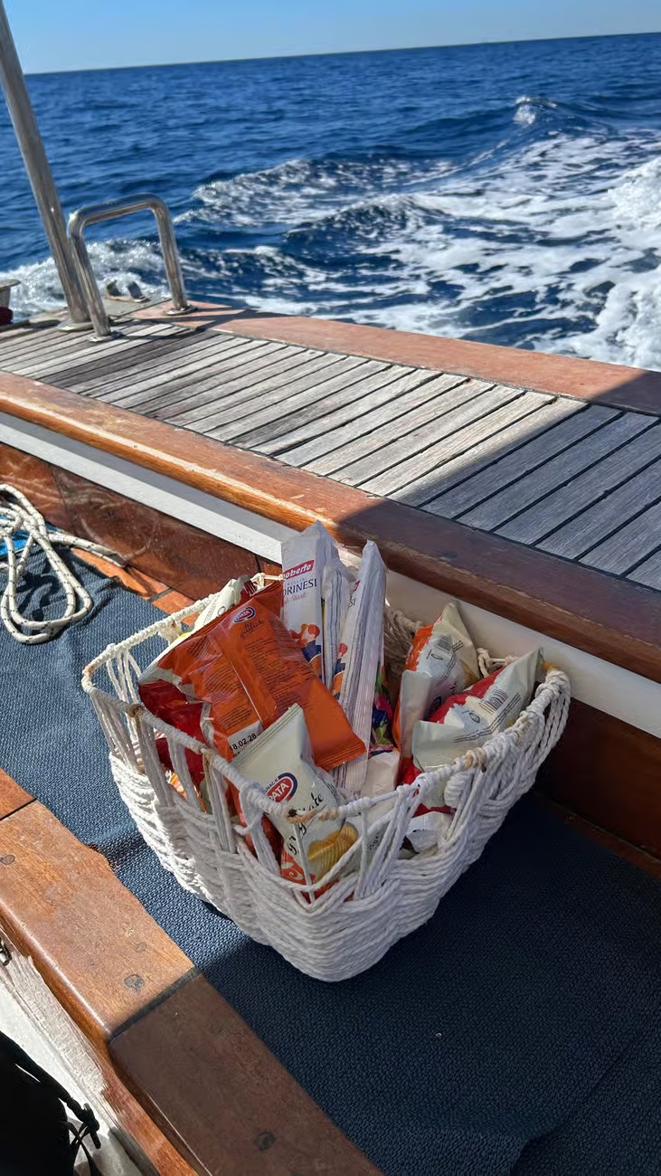 Capri Boat Experience: Faraglioni, Caves, Swim, Limoncello & Snacks - Photo 10