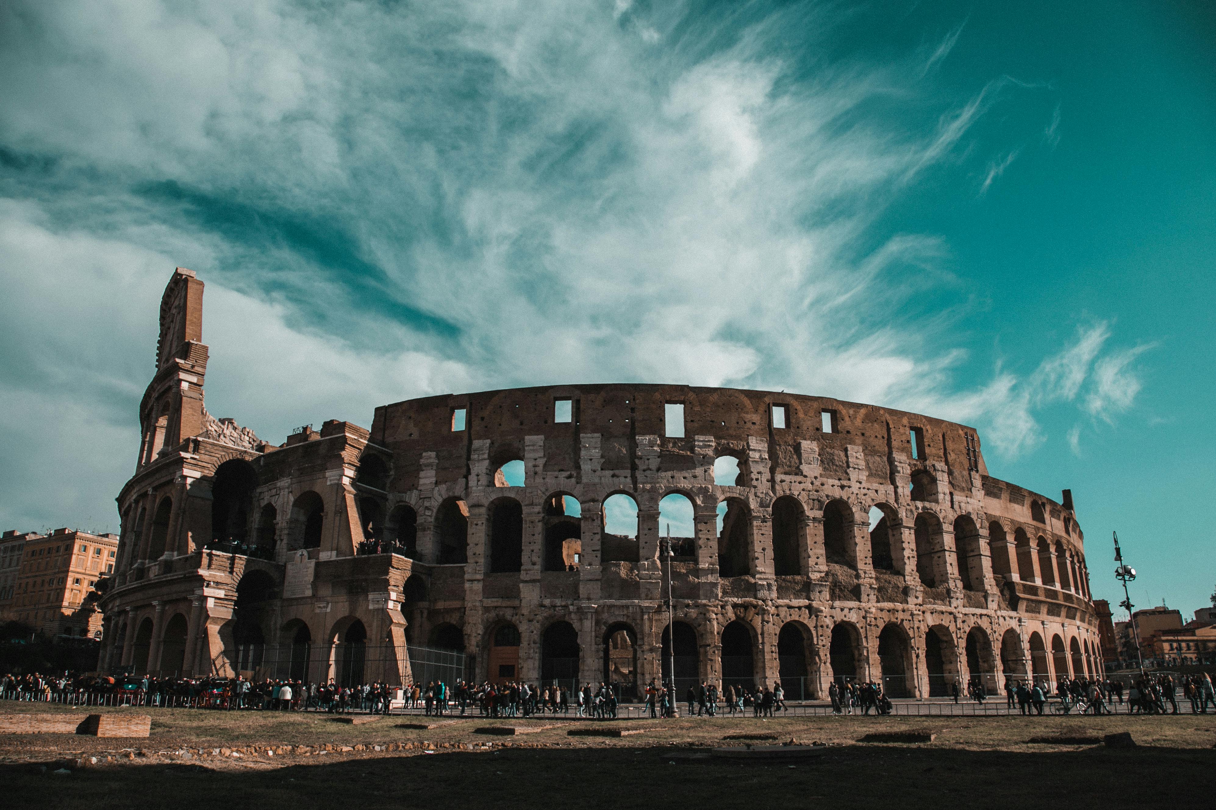 Entry to the Colosseum, Roman Forum, and Palatine Hill with Audioguide + Guided Tour of the Historic Center - Accommodations in Rome