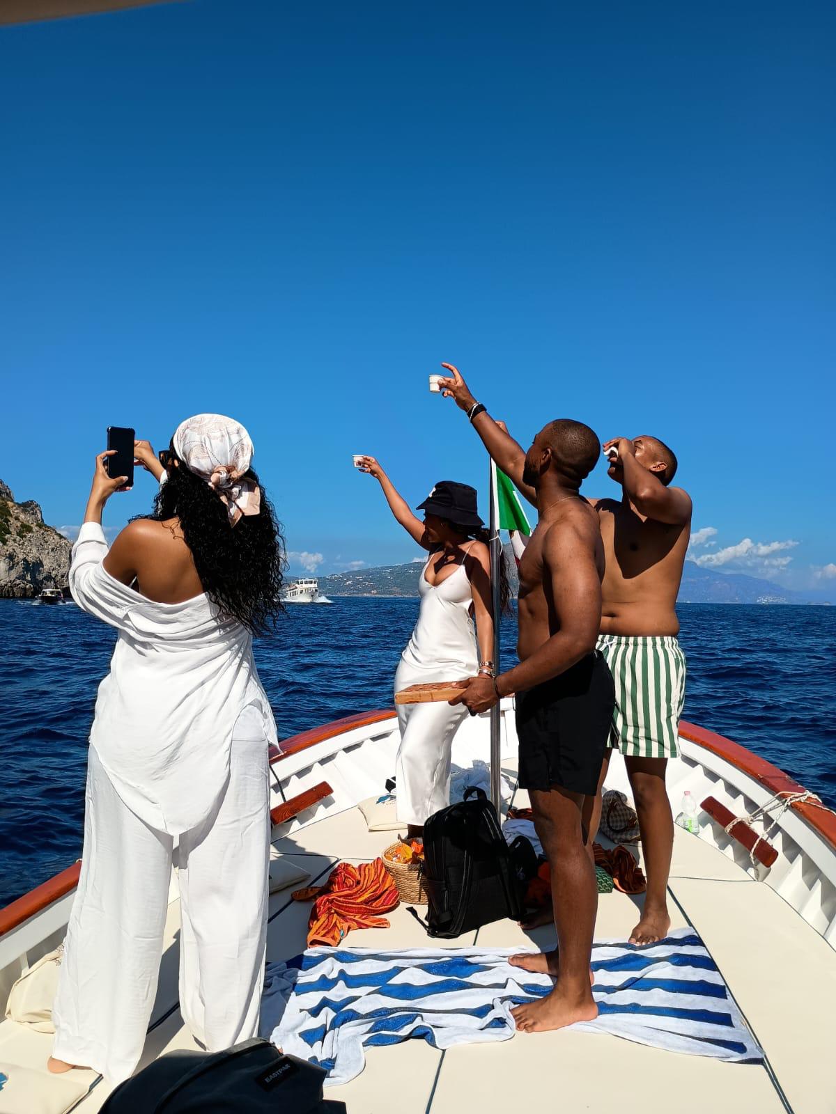 Capri Boat Experience: Faraglioni, Caves, Swim, Limoncello & Snacks - Photo 11
